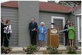 Former President George H.W. Bush and Mrs. Barbara Bush share a laugh with Mrs. Laura Bush and Midland friends, George Scott, Jan O'Neill, and Joe O'Neill, after cutting the ribbon on Tuesday, April 11, 2006, at the dedication of the President George W. Bush's Childhood Home in Midland, Texas.