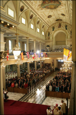 President George W. Bush and Laura Bush, center-front row, join hundreds of guests and parishioners Tuesday, Aug. 29, 2006, during a service at New Orleans' St. Louis Cathedral commemorating the first anniversary of Hurricane Katrina.