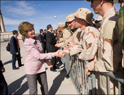 Mrs. Laura Bush greets base personnel from Kirtland Air Force Base Friday, Feb. 3, 2006, before departing Albuquerque for Dallas.