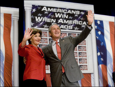 President George W. Bush and Mrs. Bush wave to the audience following the President's remarks on the 2006 agenda, Wednesday, Feb. 1, 2006 at the Grand Ole Opry House in Nashville.