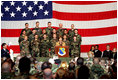 Mrs. Laura Bush addresses an audience of U.S.troops during a visit to Aviano Air Base, in Aviano, Italy, Friday, Feb. 10, 2006.