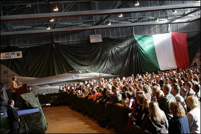 Laura Bush addresses an audience of U.S. troops during a visit to Aviano Air Base, in Aviano, Italy, Friday, Feb. 10, 2006.