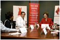 Laura Bush participates in a roundtable with Delphia Daniel, heart disease survivor, and Dr. Paul Colavita, Cardiologist, Sanger Clinic, at Carolinas Medical Center Wednesday, Feb. 15, 2006, in Charlotte, NC, to promote heart disease awareness, education and prevention. Heart disease is the leading cause of death of women in the US.
