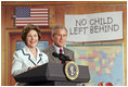 Laura Bush and President Bush discuss "No Child Left Behind," at North Glen Elementary School in Glen Burnie, Md., Monday, Jan. 9, 2006. "Interestingly enough, in 2003, 45 percent of the African American students in this school rated proficient in reading; in 2005, 84 percent are proficient. In other words, this is a school that believes every child can learn. Not just certain children, every child," said the President.