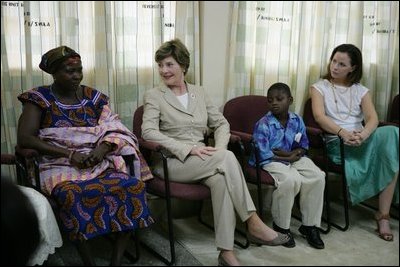 Mrs. Laura Bush and her daughter Barbara talk with patients, their family members and staff at the Korle-Bu Treatment Center, Tuesday, Jan. 17, 2006 in Accra, Ghana.