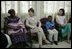 Mrs. Laura Bush and her daughter Barbara talk with patients, their family members and staff at the Korle-Bu Treatment Center, Tuesday, Jan. 17, 2006 in Accra, Ghana.