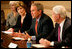 President George W. Bush, with Mrs. Bush, speaks to the press during a meeting with foundations to help aid Gulf coast Recovery at the White House, Thursday, Jan. 19, 2006.