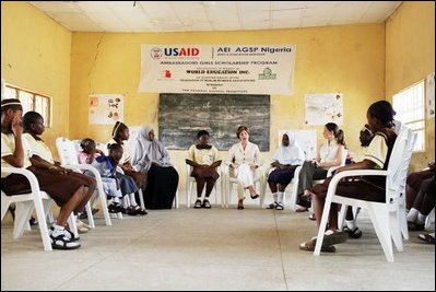 Laura Bush and daughter Barbara participate in a round-table discussion with students Wednesday, Jan. 18, 2006, at Model Secondary School in Abuja, Nigeria.