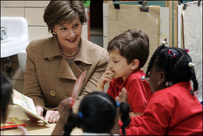 Laura Bush reads with children Wednesday, Jan. 26, 2006 during a visit to the kindergarten class at the Alice M. Harte Elementary School in New Orleans, La.