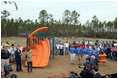 Laura Bush addresses a gathering to dedicate the new Kaboom Playground, built at the Hancock North Central Elementary School in Kiln, Ms., Wednesday, Jan. 26, 2006, during a visit to the area ravaged by Hurricane Katrina.