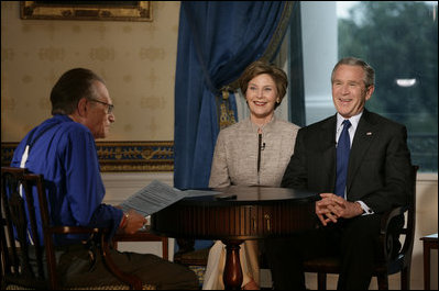 President George W. Bush and Laura Bush join CNN's Larry King at an interview Thursday, July 6, 2006 in the Blue Room at the White House.