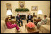 President George W. Bush and Mrs. Laura Bush visit with President Alejandro Toledo of Peru, and his wife and advisor, Mrs. Eliane Karp de Toledo, during a photo opportunity Tuesday, July 11, 2006, in the Oval Office.