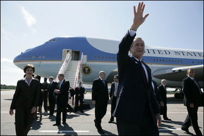 President George W. Bush and Laura Bush arrive Friday, July 14, 2006, to St. Peterburg's Pulkovo Airport, waving to well-wishers waiting to greet them. President Bush will attend the G8 Summit over the weekend.
