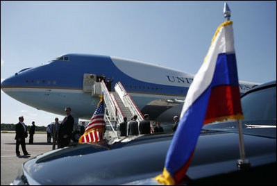 President George W. Bush and Mrs. Laura Bush wave from Air Force One upon arriving at Pulkovo International Airport for the upcoming G8 Summit in St. Petersburg, Russia, Friday, July 14, 2006.
