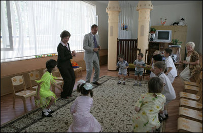 Laura Bush dances with youngsters Friday, July 14, 2006, at the Pediatric HIV/AIDS Clinical Center of Russia in St. Petersburg, Russia.