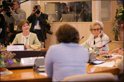 Mrs. Laura Bush and Bernadette Chirac, wife of French President Jacques Chirac participate in a meeting with other spouses of G8 leaders during the G8 Summit at Konstantinvosky Palace in Strelna, Russia, Sunday, July 16, 2006.