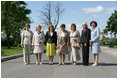 Spouses of G8 leaders pose for a photograph at Konstantinvosky Palace in Strelna, Russia, Sunday, July 16, 2006. From left, they are: Laura Bush; Bernadette Chirac, wife of French President Jacques Chirac; Sousa Uva Barroso, wife of European Commission President Jose Manuel Barroso; Flavia Franzoni, wife of Italian Prime Minister Romano Prodi, Lyudmila Putina, wife of Russian President Vladimir Putin; Laureen Harper, wife of Canadian Prime Minister Stephen Harper; and Cherie Booth, wife of British Prime Minister Tony Blair.