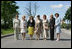 Spouses of G8 leaders pose for a photograph at Konstantinvosky Palace in Strelna, Russia, Sunday, July 16, 2006. From left, they are: Laura Bush; Bernadette Chirac, wife of French President Jacques Chirac; Sousa Uva Barroso, wife of European Commission President Jose Manuel Barroso; Flavia Franzoni, wife of Italian Prime Minister Romano Prodi, Lyudmila Putina, wife of Russian President Vladimir Putin; Laureen Harper, wife of Canadian Prime Minister Stephen Harper; and Cherie Booth, wife of British Prime Minister Tony Blair.