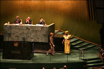 Mrs. Laura Bush walks to meet UN Protocol Officer Mary Muturi of Kenya after addressing the United Nations General Assembly's High-Level Meeting on AIDS at the United Nations in New York Friday, June 2, 2006.