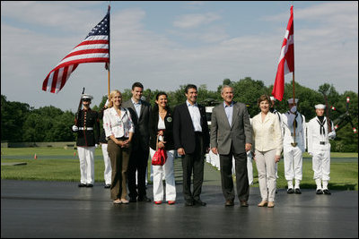 President George W. Bush and Mrs. Laura Bush welcome Prime Minister Anders Fogh Rasmussen of Denmark and his family to Camp David Friday, June 9, 2006. Pictured, from left, are the Prime Minister's daughter-in-law Kristina, son Henrik and wife Anne-Mette Rasmussen.
