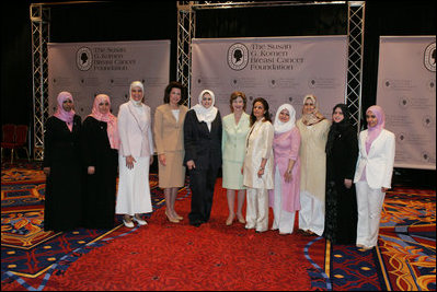 Mrs. Laura Bush joins Nancy Brinker, founder of the Susan G. Komen Breast Cancer Foundation, fourth from left, and women from Saudi Arabia and the United Arab Emirates, Monday, June 12, 2006, at the Susan G. Komen Breast Cancer Foundation's 2006 Mission Conference in Washington, D.C. Mrs. Bush announced the U.S.-Middle East Partnership for Breast Cancer Awareness and Research which allows governments, hospitals, researchers, and survivors to work with each other to help defeat breast cancer.