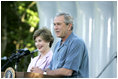 President George W. Bush and Laura Bush welcome guests to the annual Congressional Picnic on the South Lawn of the White House Wednesday evening, June 15, 2006, hosting members of Congress and their families to the "Rodeo" theme picnic.