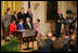 President George W. Bush addresses invited guests in the East Room of the White House prior to signing a proclamation to create the Northwestern Hawaiian Islands Marine National Monument, Wednesday, June 15, 2006.The proclamation will bring nearly 140,000 square miles of the Northwestern Hawaiian Island Coral Reef Ecosystem under the nation's highest form of marine environmental protection. Mrs. Laura Bush joined the President and distinguished guests on stage, seated from left to right, Hawaii Gov. Linda Lingle; marine biologist Sylvia Earle; and documentary filmmaker Jean-Michel Cousteau, Standing ,left to right, are U.S. Rep. Ed Case, D-Hawaii; U.S. Sen. Daniel Akaka, D-Hawaii; U.S. Commerce Secretary Carlos Gutierrez and U.S. Interior Secretary Dirk Kempthorne.