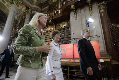 President George W. Bush and Laura Bush are led by Johanna Rachinger, Director General of the National Library in Vienna, after they arrived for a tour Wednesday, June 21, 2006, and a roundtable with foreign students.