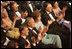 President George W. Bush and Mrs. Laura Bush join the audience in applauding the entertainment Sunday evening, June 25, 2006, at the annual Ford's Theatre gala to benefit the historic theater. The program, "An American Celebration at Ford's Theatre," will be televised on July 4, 2006.