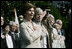 Mrs. Laura Bush stands with Lynne Pace and her husband, Chairman of the Joint Chiefs of Staff General Peter Pace, during the official arrival ceremony for Prime Minister Junichiro Koizumi of Japan on the South Lawn Thursday, June 29, 2006.