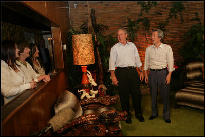 President George W. Bush and Prime Minister Junichiro Koizumi of Japan tour Graceland, the home of Elvis Presley in Memphis, Tenn. Priscilla Presley, former wife of Elvis Presley, and daughter Lisa-Marie Presley participated in the tour.