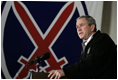 President George W. Bush addresses U.S. and Coalition troops Wednesday, March 1, 2006, during a stopover at Bagram Air Base in Afghanistan, prior to his visit to India and Pakistan.