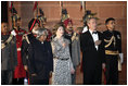 President and Mrs. Bush stand with India's President A.P.J. Abdul Kalam during the playing of their respective national anthems Thursday, March 2, 2006, at the State Dinner in New Delhi.
