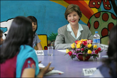 Mrs. Laura Bush listens to a question during an informal group discussion with teachers and students on her tour of Prayas, Thursday, March 2, 2006, in New Delhi, India.
