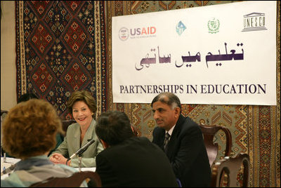 Mrs. Laura Bush attends a roundtable discussion during an Education Through Partnerships meeting with representatives from USAID, UNESCO & CRI at library at the U.S. Embassy , Saturday, March 4, 2006 in Islamabad, Pakistan.