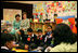 Mrs. Laura Bush observes a class lesson in the Children's Resources International class room at the U.S. Embassy , Saturday, March 4, 2006 in Islamabad, Pakistan.