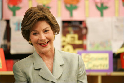 Mrs. Laura Bush reacts to a question as she attends a class lesson in the Children's Resources International clasroom at the U.S. Embassy , Saturday, March 4, 2006 in Islamabad, Pakistan.