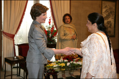 Mrs. Laura Bush greets guests during her meeting with Mrs. Sehba Musharraf, wife of President Pervez Musharraf, at Aiwan-e-Sadr, Saturday, March 4, 2006 in Islamabad, Pakistan.