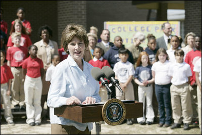 Mrs. Laura Bush addresses a crowd at the College Park Elementary School in Gautier, Miss., Wednesday, March 8, 2006, announcing the establishment of The Gulf Coast School Library Recovery Initiative, to help Gulf Coast schools that were damaged by the hurricanes rebuild their book and material collections. The initiative was established by the Laura Bush Foundation for American Libraries.