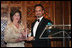 Mrs. Laura Bush is presented with an award by Kuwait Ambassador Al-Sabah, Tuesday evening, March 8, 2006 at the at "Bridges of Hope: Educating Children for a Better Future," The Kuwait-America Foundation's 2006 Benefit Dinner in Washington, in honor of her dedication to help improve the living conditions and education of children around the world.