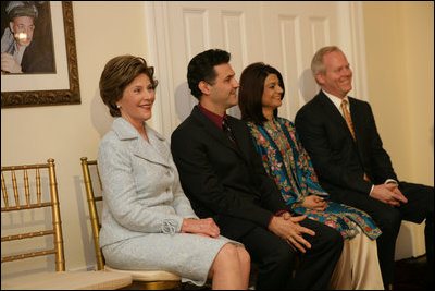 Mrs. Laura Bush attends the Afghan Children's Initiative Benefit Dinner at the Afghanistan Embassy in Washington, DC on Thursday evening, March 16, 2006. Seated with Mrs. Bush are Dr. Khaled Hosseini, author of The Kite Runner; Mrs. Shamim Jawad, host and wife of the Afghan Ambassador to the U.S.; and Mr. Tim McBride, member of the U.S.-Afghan Women's Council.