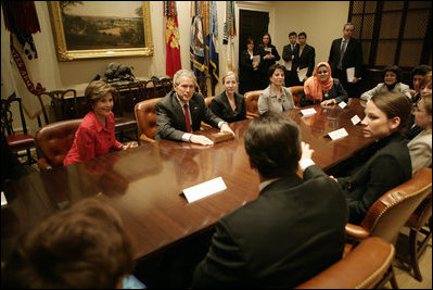 President George W. Bush and Mrs. Laura Bush meet Tuesday, March 21, 2006 in the Roosevelt Room of the White House, with members of the Iraq and Afghanistan Non-Govermental Organizations.
