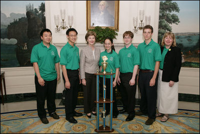 Mrs. Laura Bush welcomes the 2006 National Science Bowl Champions from State College, Pa., to the White House, Monday, May 1, 2006. From left to right are students Barry Liu, Jason Ma, Ylaine Gerardin, Galen Lynch, Francois Greet and their team coach Julie Gittings. The National Science Bowl, the nationís largest science competition, is co-sponsored by the U.S. Department of Energy.