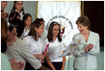 Laura Bush participates in an education roundtable at the Escuela de los Estados Unidos. San Jose, Costa Rica May 8, 2006.