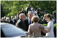 President George W. Bush and Laura Bush welcome Australian Prime Minister John Howard and Mrs. Janette Howard to the White House during the State Arrival Ceremony on the South Lawn Tuesday, May 16, 2006.
