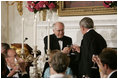 President George W. Bush and Prime Minister John Howard of Australia exchange toasts during an official dinner in the State Dining Room Tuesday, May 16, 2006.
