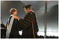Dr. Roy Nirschel, President of Roger Williams University, thanks Mrs. Laura Bush for delivering the commencement speech at Roger Williams University on Saturday, May 20, 2006, in Bristol, R.I. Mrs. Bush was awarded an honorary doctorate in education from Roger Williams University.
