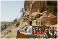 Mrs. Laura Bush speaks from Long House cliff dwelling, Thursday, May 23, 2006, in the western portion of Mesa Verde National Park, Mesa Verde, Colo. Long House was excavated between 1959 and 1961 as part of the Westerill Mesa Archeological Project.