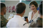 Mrs. Laura Bush visits during breakfast with military personnel Tuesday, Nov. 21, 2006, at the Officers Club at Hickam Air Force Base in Honolulu, Hawaii.