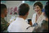 Mrs. Laura Bush visits during breakfast with military personnel Tuesday, Nov. 21, 2006, at the Officers Club at Hickam Air Force Base in Honolulu, Hawaii.